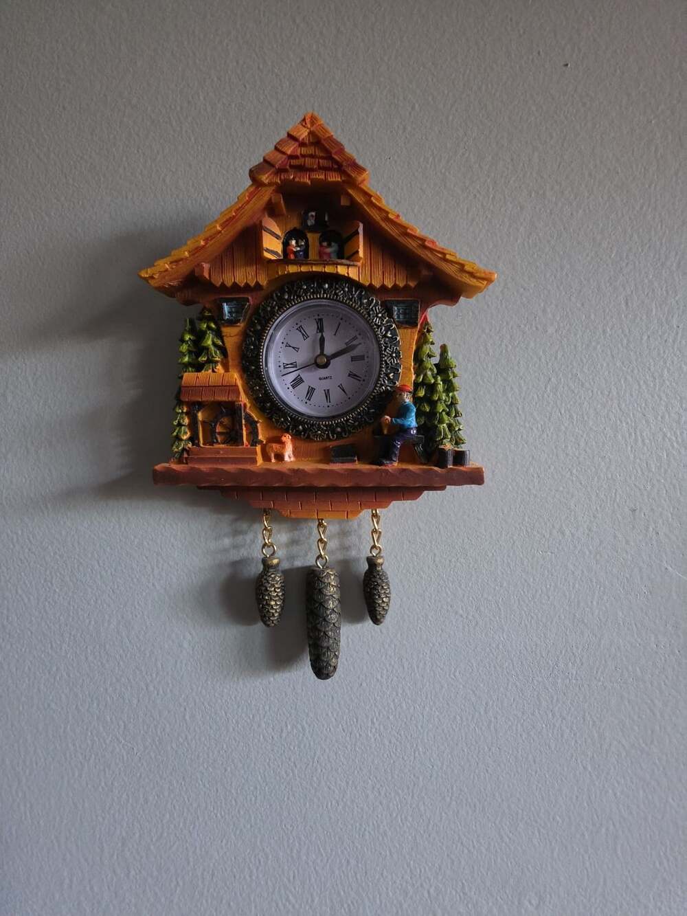 Swiss Cottage Clock Wall Clock with Pinecones and Little People